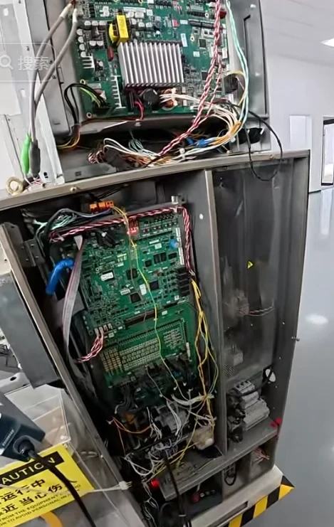 technician diagnosing elevator spare parts